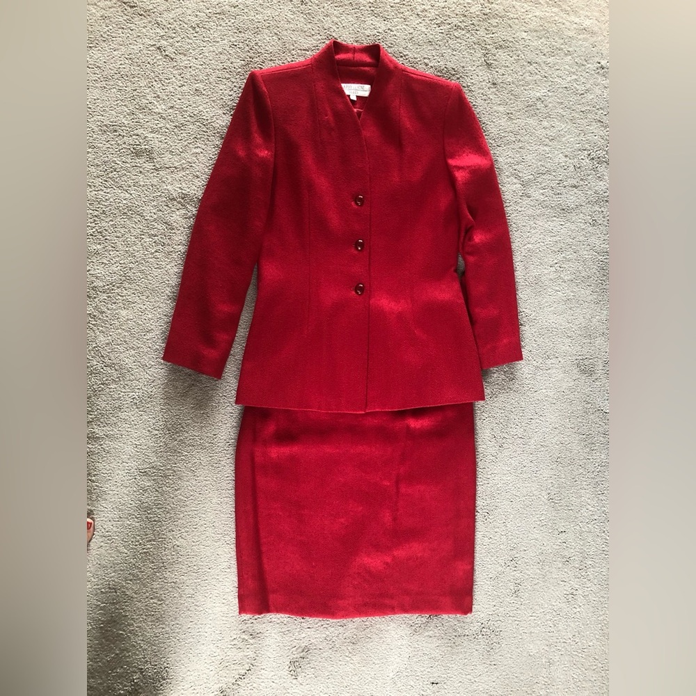 Not available til April

Elegant Red Skirt Suit
